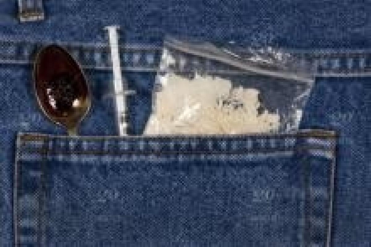 Heroin in the pocket of blue jeans