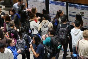 Students at a research poster session