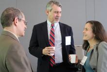 Duke Policy Bridge Director & Professor of Public Policy Frederick Mayer, center, talks with senior advisers Steven Mange, N.C. Attorney General's Office, left, and Jenni Owen, N.C. Governor's Office